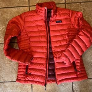 Patagonia coat used large women’s orange like color. Used. Smoke free home